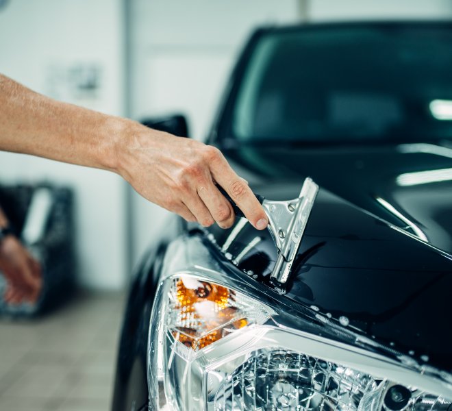 Specialist prepares car for protect against chips